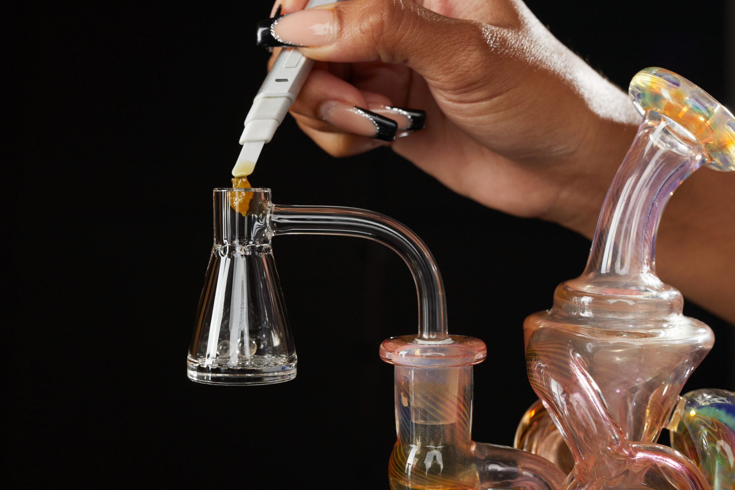 A dab rig being heated with a torch